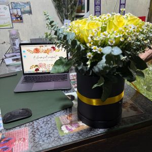 China roses with Chamomile in a box