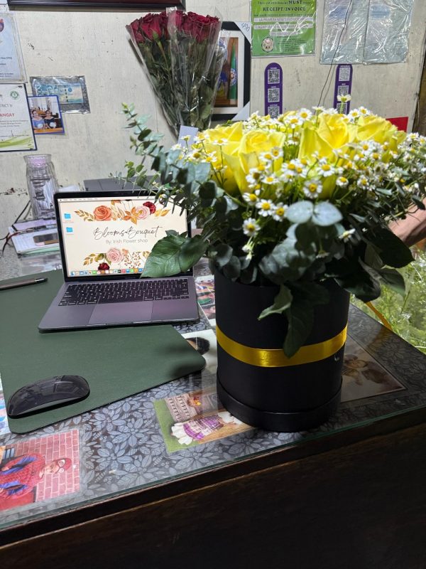 China roses with Chamomile in a box